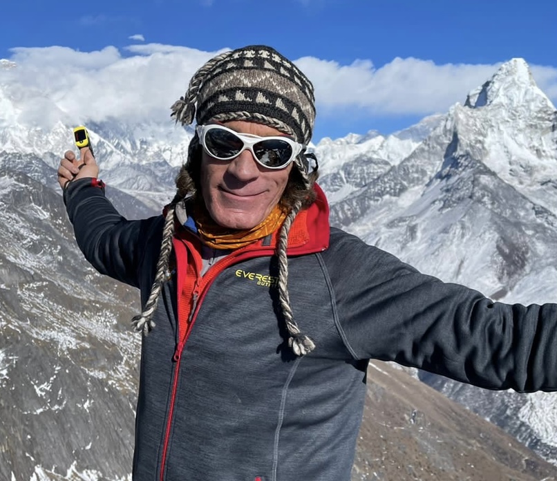 Dr. Darryl Macias on a mountain